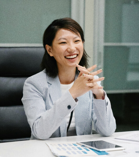 Smiling Odextra consultant meeting with clients to discuss web hosting and business solutions